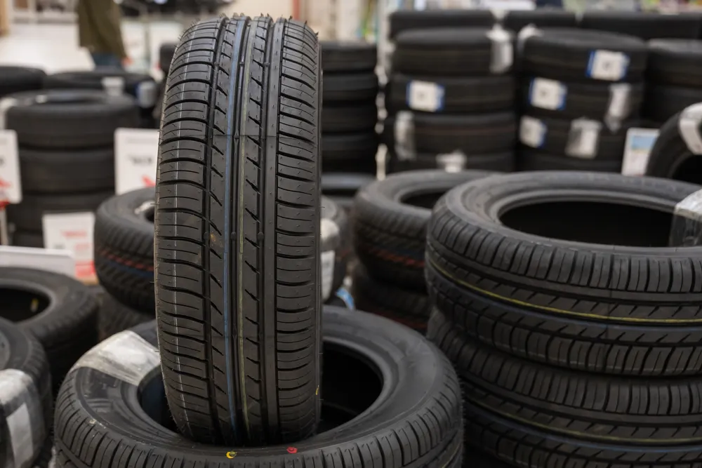 New car tyres displayed inside a tyre shop